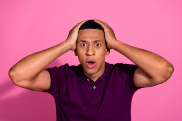 Photo portrait of nice young male touch head shocked dressed stylish violet garment isolated on...