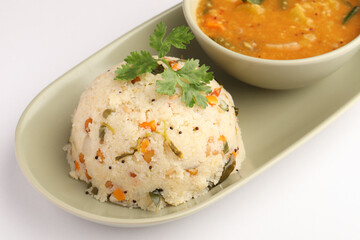 Rava Upma - Popular south Indian breakfast wiih semolina and vegetables, selective focus, Upma or upama is a South Indian breakfast