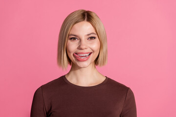 Fototapeta premium Photo of adorable charming girl wear stylish brown clothes lick teeth isolated on pink color background