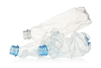 Crumpled disposable plastic bottles isolated on white