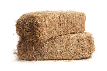 Bales of dried straw isolated on white