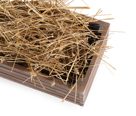 Dried straw in wooden crate isolated on white, above view
