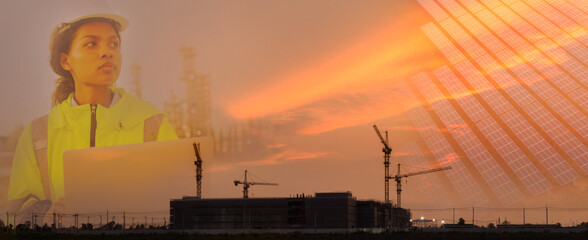 Female engineer, building and industrial construction crane with colorful sky at dusk.