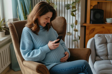 Obraz premium Joyful pregnant woman in a cozy room smiles as she reads messages on her phone, caressing her belly, surrounded by houseplants and modern decor, emanating a warm, peaceful ambiance
