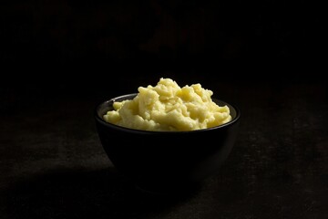 Indulgent treat of mashed potatoes with garlic butter and fresh herbs