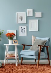 A light blue wall with white photo frames, next to the frames is an armchair and coffee table on which there were books and flowers in pots