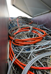 electrical cords at the electrical cord scrapyard for recycling copper and polluting plasti