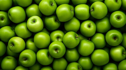 green apples piled up on each other background