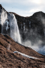 Snowy waterfall with ice
