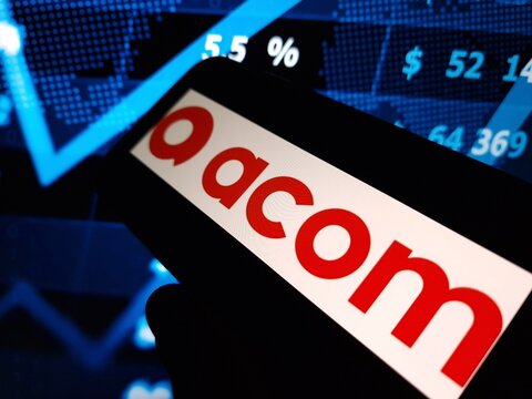 Konskie, Poland - May 15, 2024: Acom company logo displayed on mobile phone