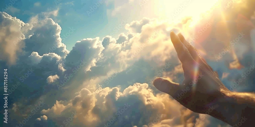Wall mural person holding their hand up in the air with the sun shining in the sky praising and praying - Wall murals