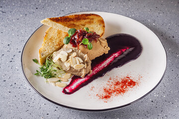 chicken duck liver pate on a white plate
