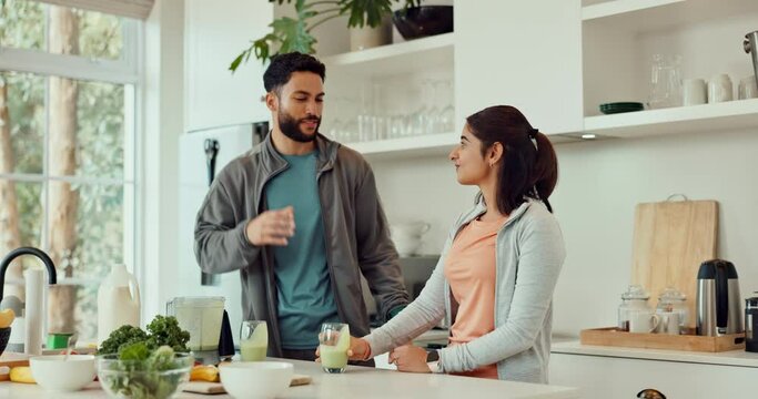 Workout, smoothie and couple in kitchen with drink for health, wellness and detox after exercise. Dating, home and man and woman with vegetables or fruit for green juice, protein shake and milkshake