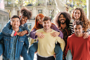 Group of young people outdoors having fun and representing joy. Concept: together