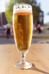 Glass of beer in the sun