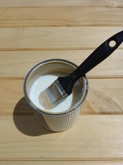 Pot of Wood Varnish on Wood