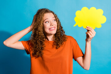 Photo of young red hair girl with curls in orange t shirt hold paper bubble mind mistaken idea...