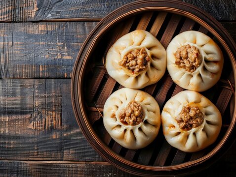 Top view of Chinese baozi with pork filling, using the rule of thirds, with ample copy space