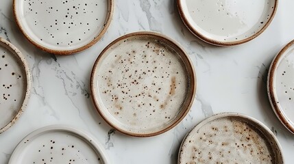   A table topped with brown sprinkles on a white counter