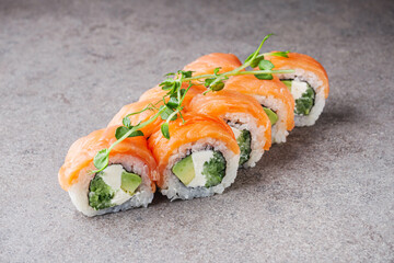 delicious fresh sushi roll philadelphia cheese with salmon eel cucumber and avocado