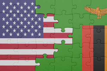 puzzle with the colourful national flag of zambia and flag of united states of america .