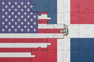 puzzle with the colourful national flag of dominican republic and flag of united states of america .