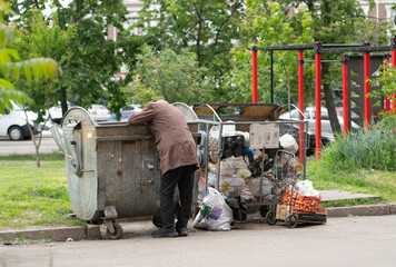 socially unprotected group of society, hungry poor old people are forced as homeless vagabonds to...