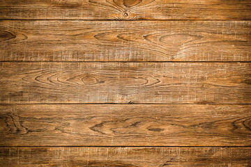 Aged textured surface, detailed closeup of a brown wooden background with a grainy texture, old wood pattern. Flooring material backdrop.