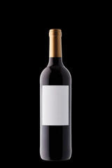 Bottle of wine with a white label with beautiful highlights on a black background
