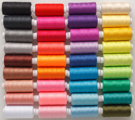 Set of colorful spools of thread
