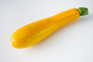 fresh natural zucchini on a white background
