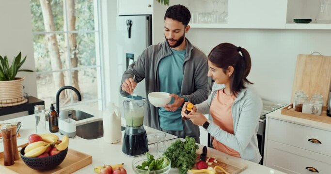 Blender, smoothie and couple in kitchen with fruit for health, wellness and detox after workout. Dating, home and man and woman with vegetables and honey for green juice, protein shake and milkshake