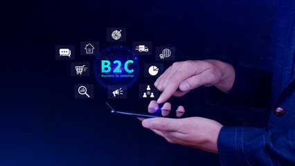 B2C, Business to customer marketing strategy concept. Businessman holding with virtual B2C icon for business strategy, communication, feedback, online marketing, Ecommerce marketing strategy.