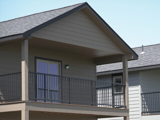 Two story duplex home balcony.