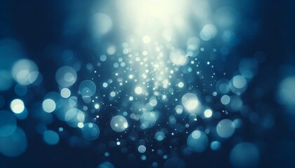 Soft-focus background image with bokeh lights in shades of midnight blue. 