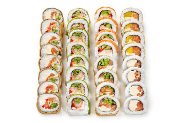 Enticing set of various sushi rolls on white background
