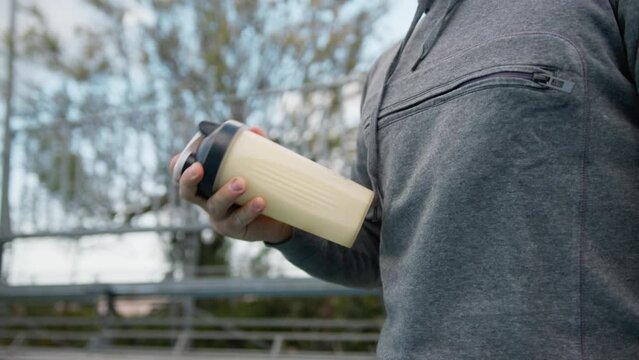 Athlete Man Drinks Sports Energizing Outside After Training