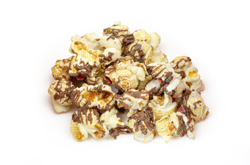 Pile of chocolate covered candy popcorn isolated on white background