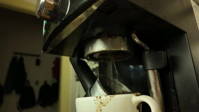 Slow motion burst levers on a lever coffee machine. A ruptured lever on a lever coffee maker. The concept of coffee machine malfunctions and buying a new coffee machine.