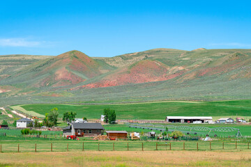 landscape of farm in mountain valley