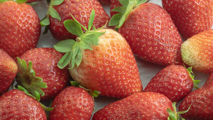 pile of natural strawberries Melissa,mucchio di fragole Melissa naturali,macro close-up