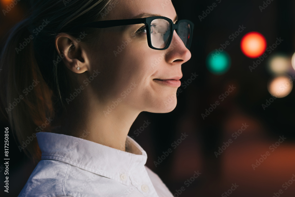 Wall mural interactive kiosk with public transport subway map.female standing at big display with smartphone in