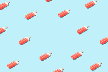 Creative pattern with ice cream on blue background. Minimal summer concept.