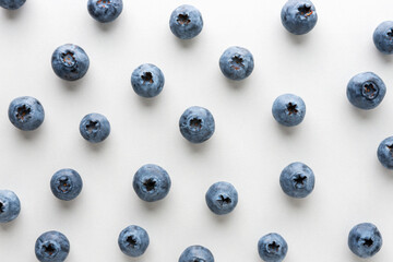 Fresh ripe organic blueberries on white background. Food concept.