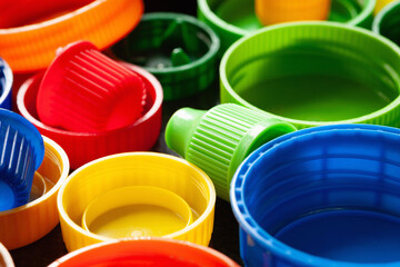 Plastic caps. Multi-colored plastic caps. Recycling of plastic
