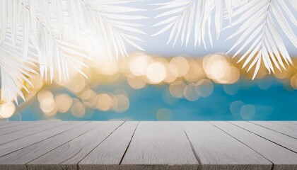 summer table and sea with blurred leaves palm and defocused bokeh light on ocean wooden plank in...