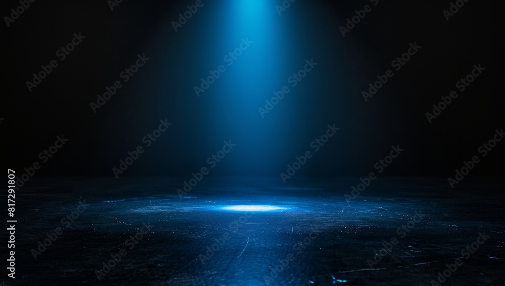 Poster a black background with a single, bright blue light shining down in the center of it creating an eff