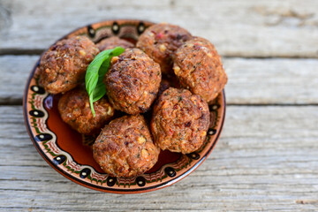 Home made Fried  pork meatballs  outdoor on wooden rustic background