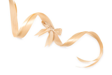 Golden satin ribbons with bow isolated on white, top view