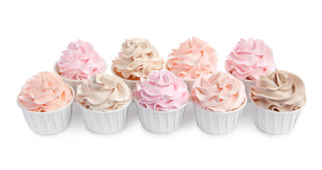 Tasty cupcakes with cream isolated on white